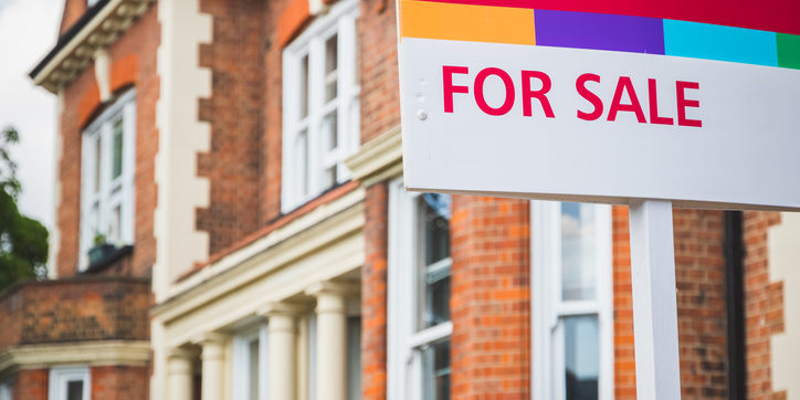 For Sale sign displayed outside a terraced house in Crouch End, London For Sale Retrofit
